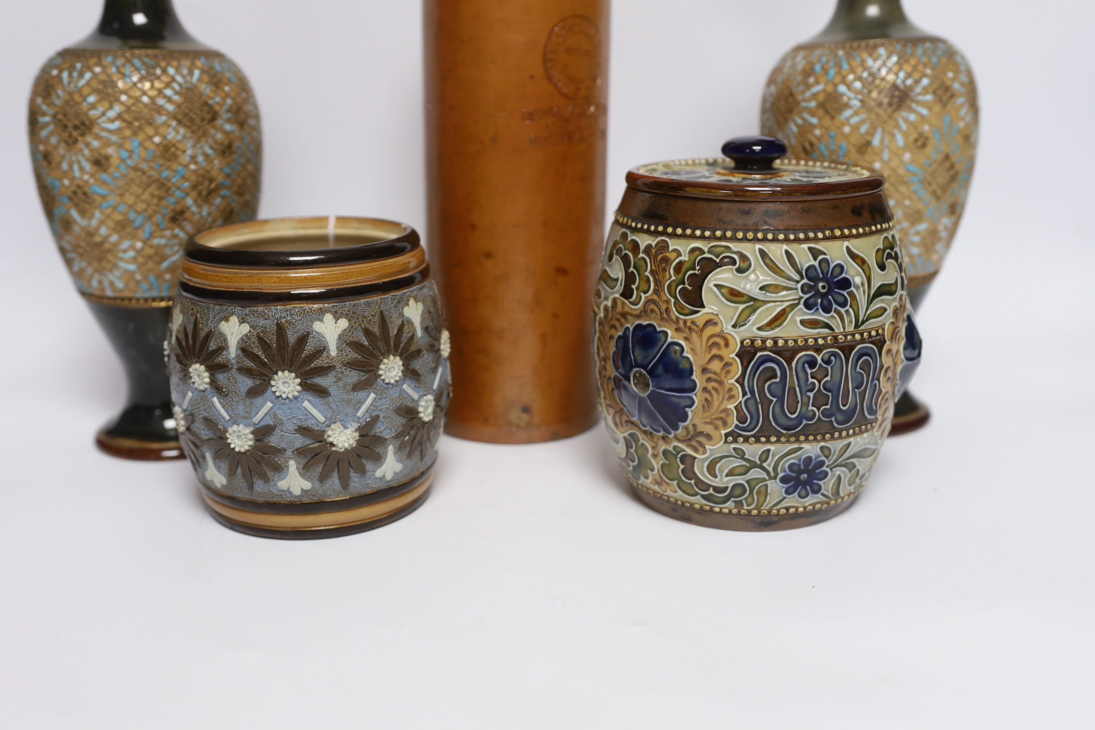 A pair of Doulton Lambeth vases, three jars, two with covers and a Georg Kreuzberg terracotta bottle